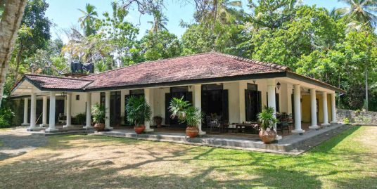 Colonial Estate with Renovation Potential on Nearly 2 Acres