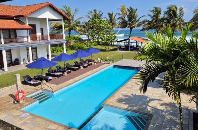 Beachfront Villa Hotel for Sale Luxury Colonial-Style Retreat with Private Beach Access
