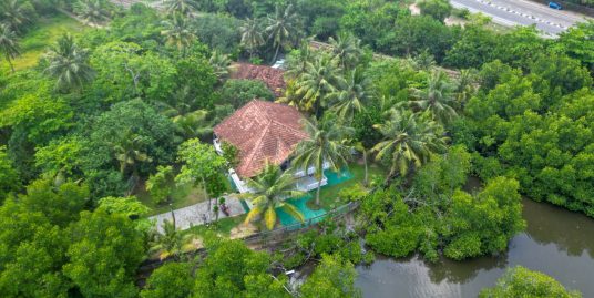 Two Houses on a River View with walking distance to the Beach