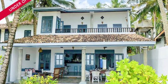 A private two-bedroom seaside retreat with direct beach access